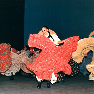 Women twirl their skirts in a suite of dances from the era of the Mexican Revolution.